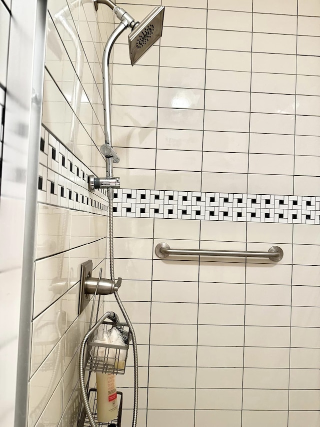 interior space featuring tiled shower