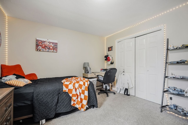 bedroom featuring a closet and carpet