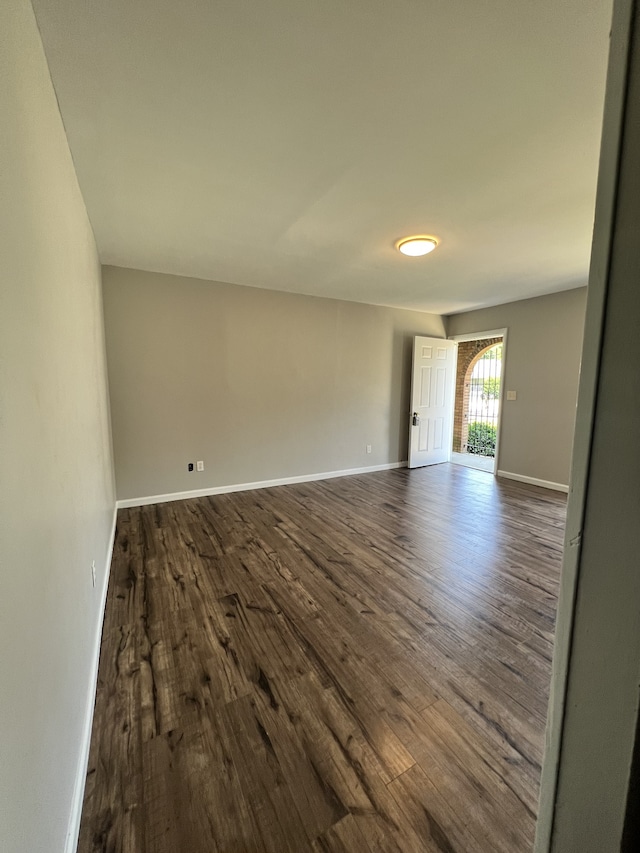 unfurnished room featuring hardwood / wood-style floors