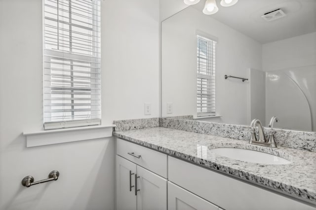 bathroom featuring vanity