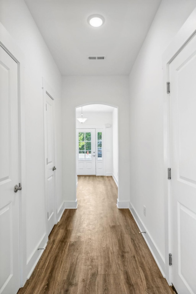 hall featuring dark hardwood / wood-style floors