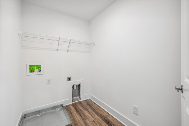 laundry area with dark hardwood / wood-style flooring, hookup for a washing machine, and hookup for an electric dryer