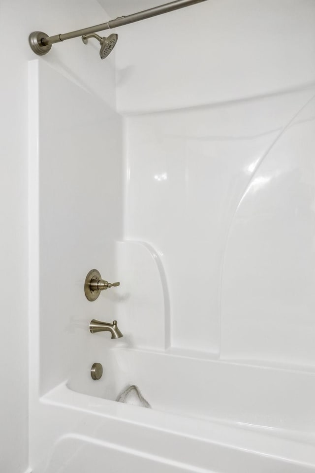 bathroom with shower / bath combination