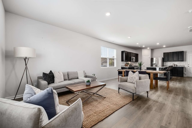 living room featuring light hardwood / wood-style floors