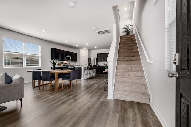 entrance foyer featuring hardwood / wood-style floors