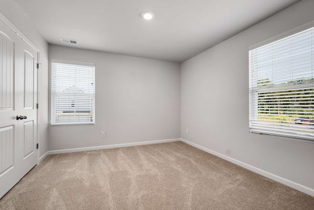 view of carpeted spare room