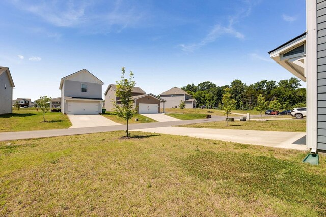 view of yard with a garage