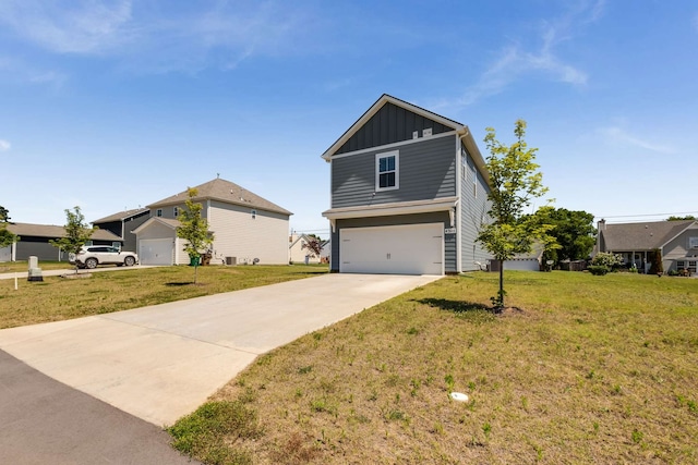 view of front of property featuring a garage and a front lawn