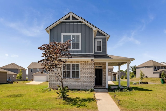 view of front of home with a garage and a front yard