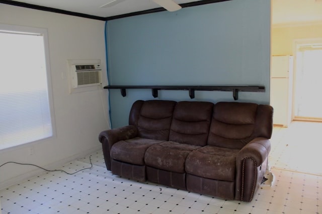 living room featuring crown molding and an AC wall unit