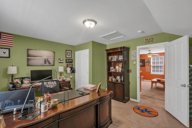 carpeted office featuring ceiling fan