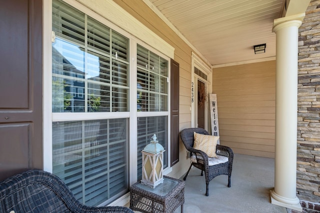 view of patio featuring a porch