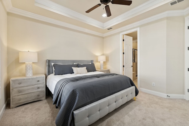 bedroom with ensuite bathroom, crown molding, ceiling fan, and light carpet