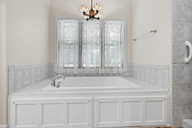 bathroom with a garden tub