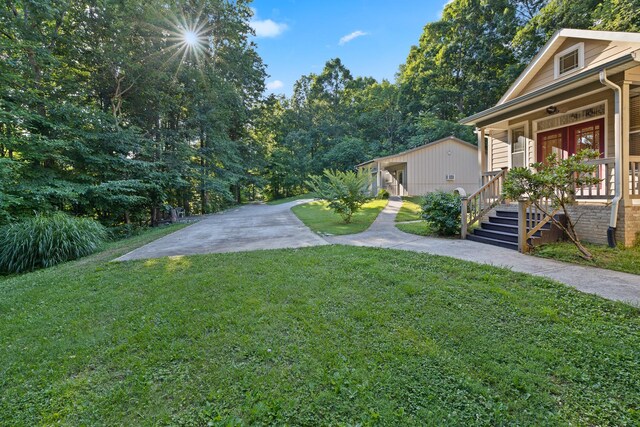 view of yard featuring a porch