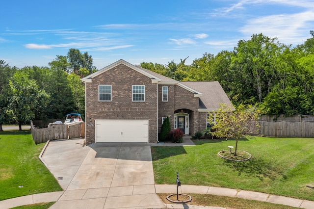 view of front of house featuring a front lawn and a garage