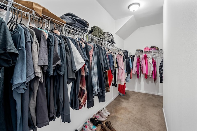 spacious closet featuring carpet and lofted ceiling