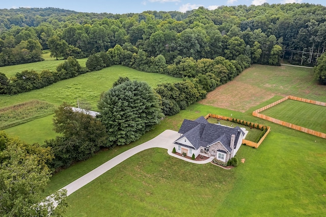 birds eye view of property featuring a rural view