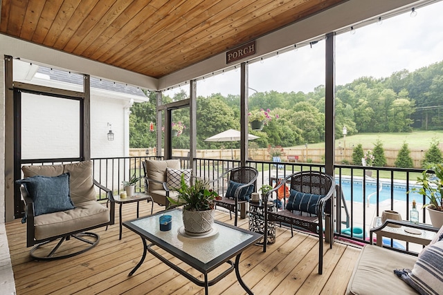 sunroom with wood ceiling