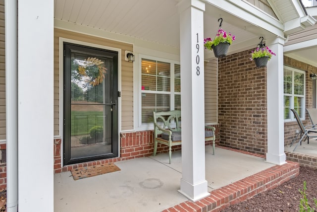 entrance to property with covered porch