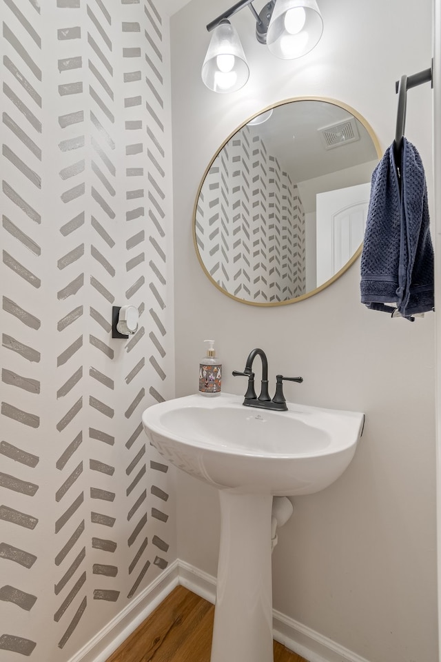 bathroom featuring hardwood / wood-style flooring