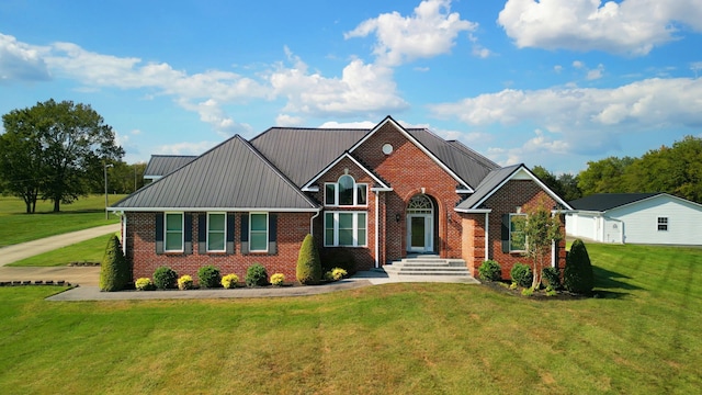 view of front of property with a front lawn