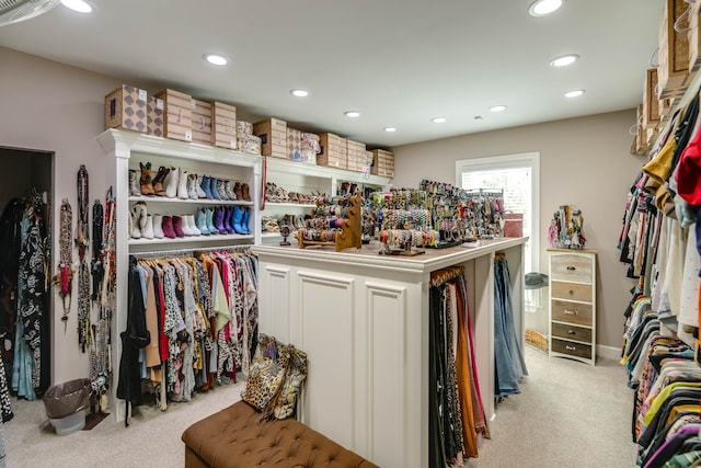 spacious closet with light colored carpet