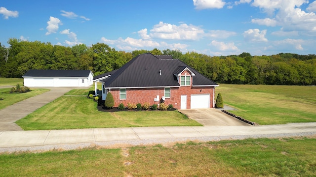 view of side of home with a lawn and a garage