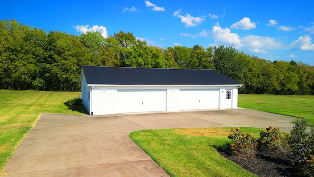 garage with a lawn