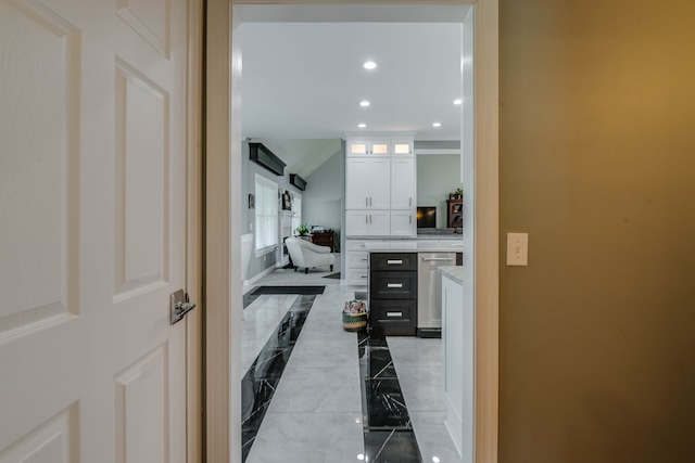 hall with light tile patterned flooring