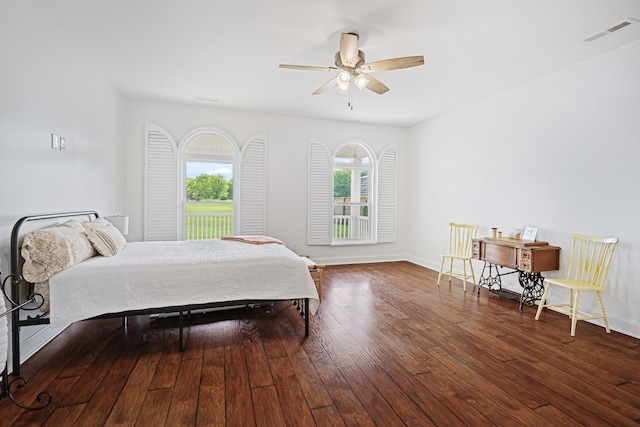 bedroom with hardwood / wood-style floors and ceiling fan