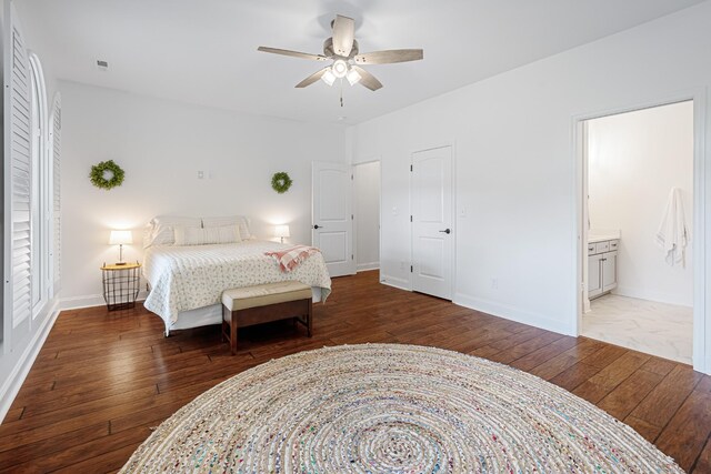 bedroom with ceiling fan, wood-type flooring, and ensuite bathroom