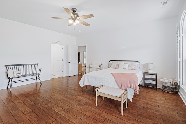 bedroom with ceiling fan and hardwood / wood-style floors