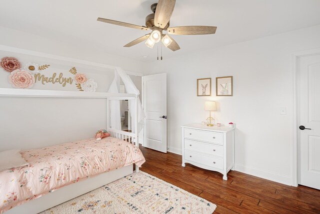 bedroom featuring ceiling fan and dark hardwood / wood-style floors