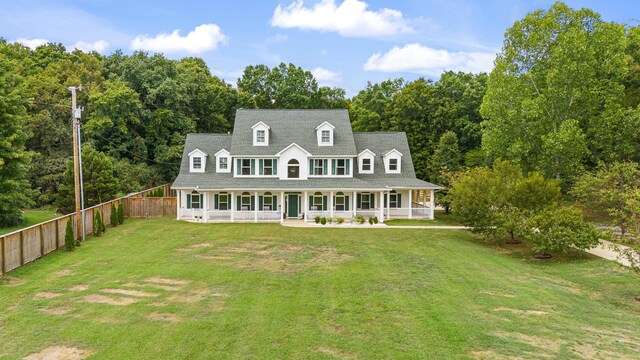 view of front of home with a front lawn and a porch