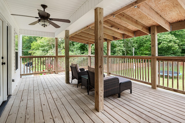 wooden terrace featuring ceiling fan