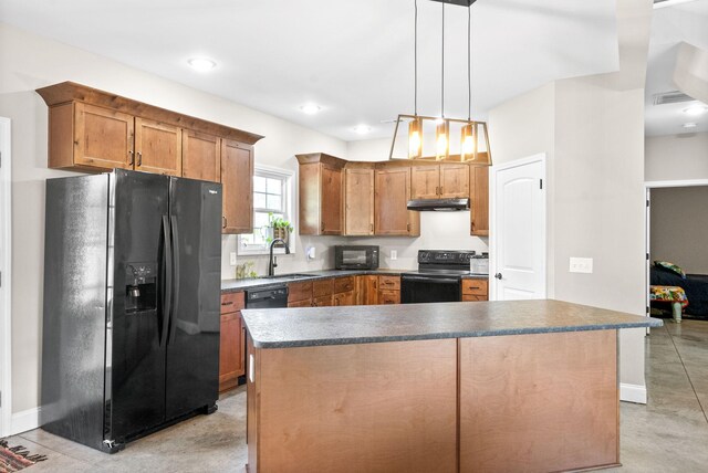 kitchen with sink, hanging light fixtures, black appliances, and a kitchen island