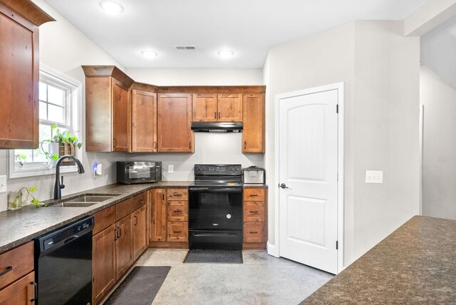 kitchen with sink and black appliances