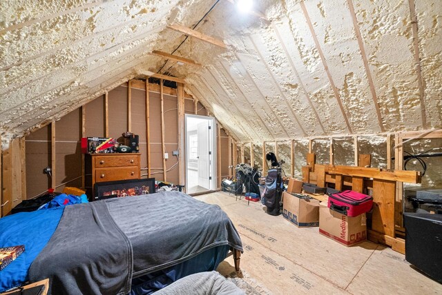 bedroom with vaulted ceiling