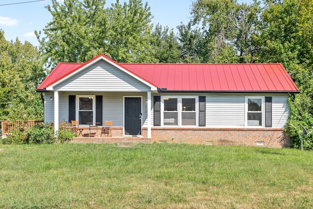 ranch-style home with a front yard