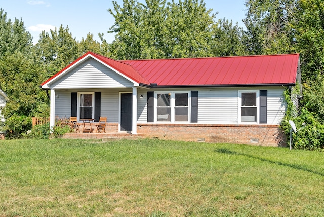 ranch-style house featuring a front yard