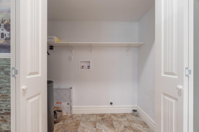 washroom featuring hookup for a washing machine, laundry area, electric dryer hookup, and baseboards