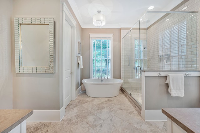 bathroom with crown molding, vanity, and independent shower and bath