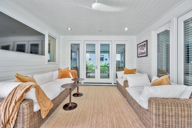 sunroom / solarium featuring wooden ceiling