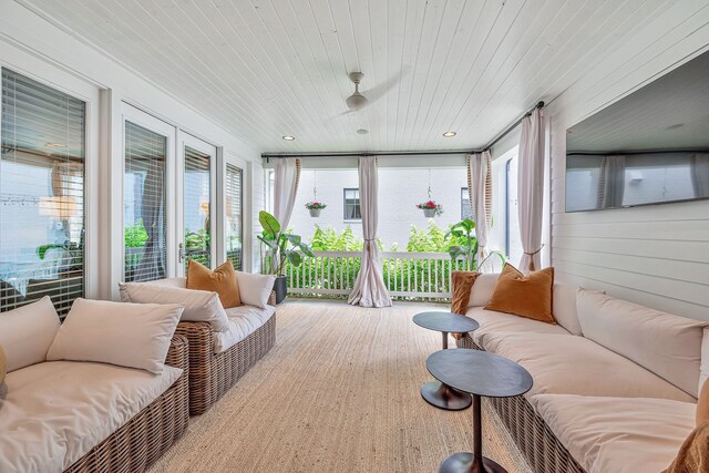 sunroom with wooden ceiling