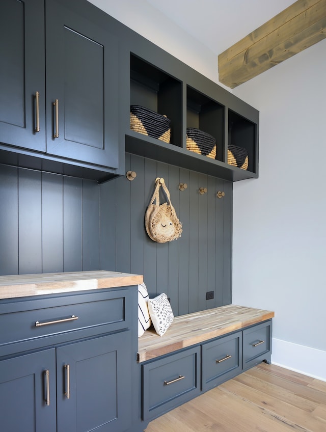 mudroom with light hardwood / wood-style flooring