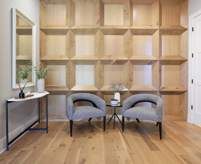 sitting room with light hardwood / wood-style floors