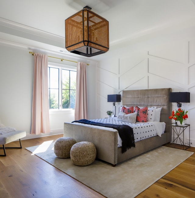 bedroom with hardwood / wood-style flooring