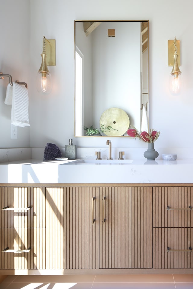 bathroom with tile patterned flooring