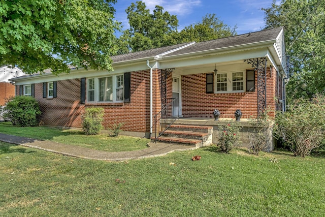 single story home with a front yard